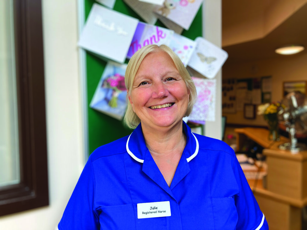 Nurse in blue uniform on ward